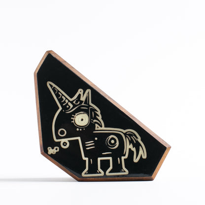 Handcrafted glow-in-the-dark talisman featuring Zyglot the tiny robot unicorn
