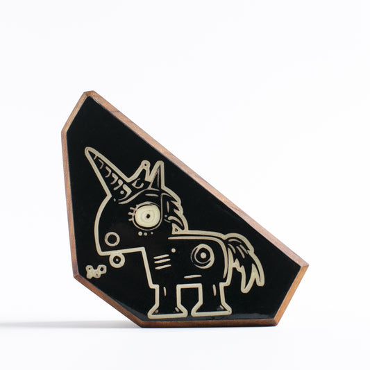 Handcrafted glow-in-the-dark talisman featuring Zyglot the tiny robot unicorn
