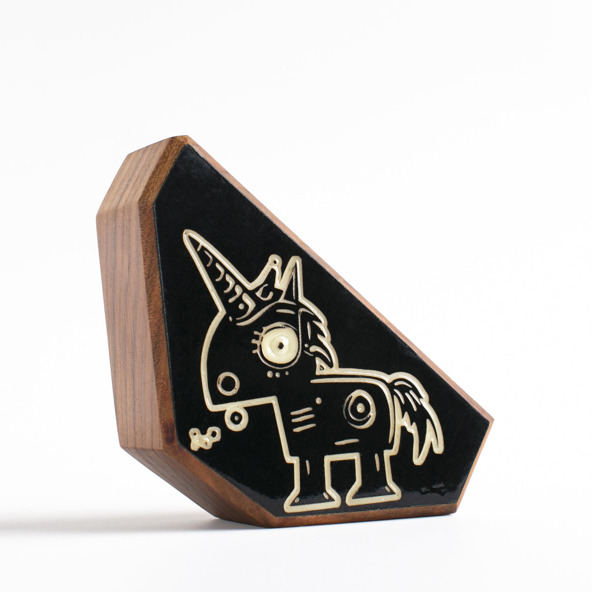 Cherry wood talisman with Zyglot design offering kids nighttime comfort and safety
