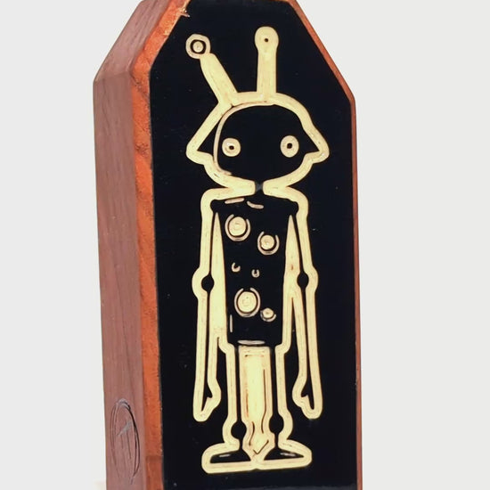 Wooden guardian Zybotronk glowing brightly to protect kids from nighttime fears
