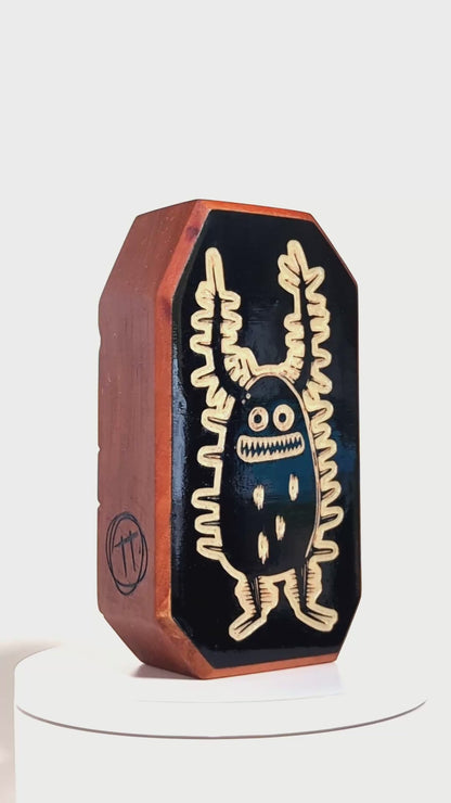 Zorplix glow-in-the-dark charm crafted to ward off monsters with its glowing antennae
