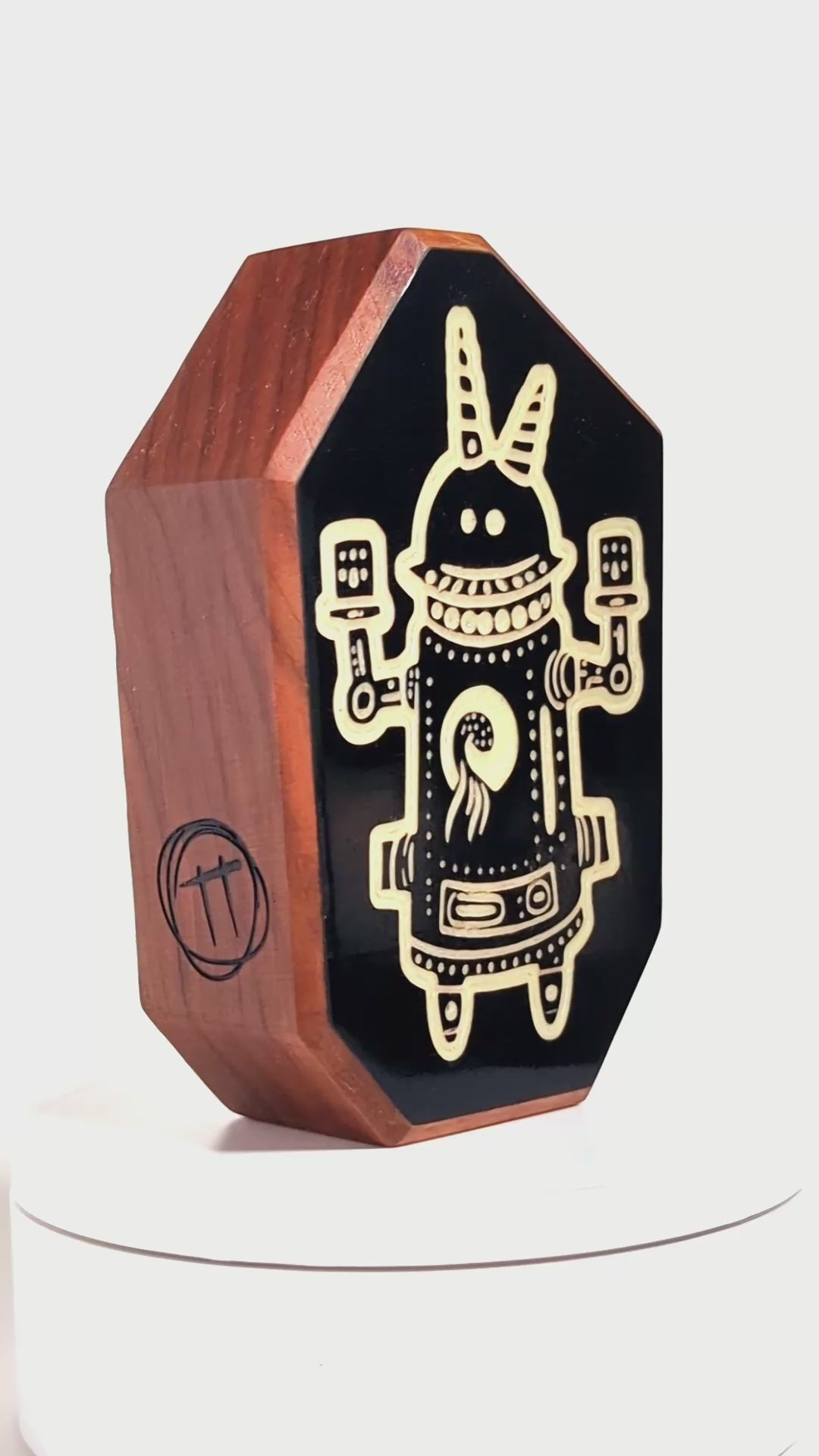 Glow-in-the-dark talisman Buzznork designed to protect kids from shadows and monsters

