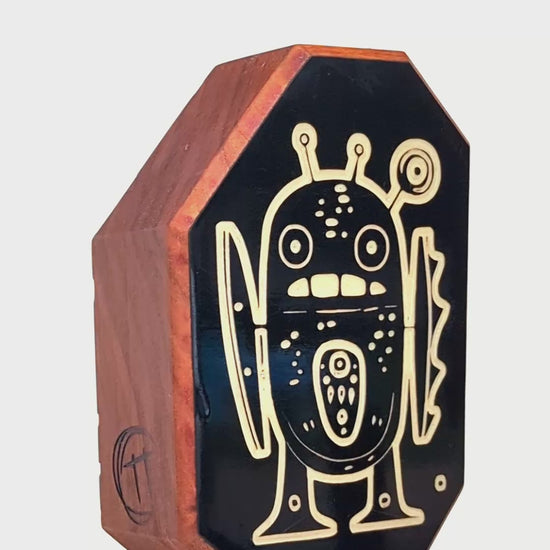 Wooden guardian Zorpwob glowing brightly to ensure bedtime security
